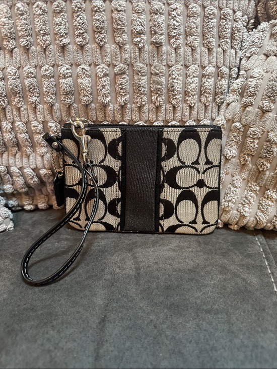 Coach Handbags - Coach Black and Beige Signature Canvas Wristlet with Strap